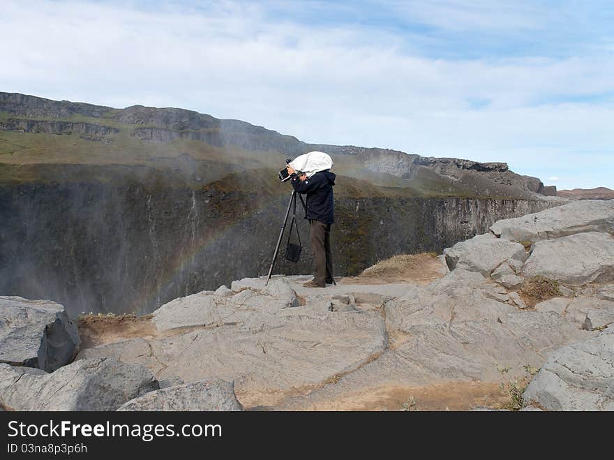 Photographer and bellows camera with tripod,. Photographer and bellows camera with tripod,