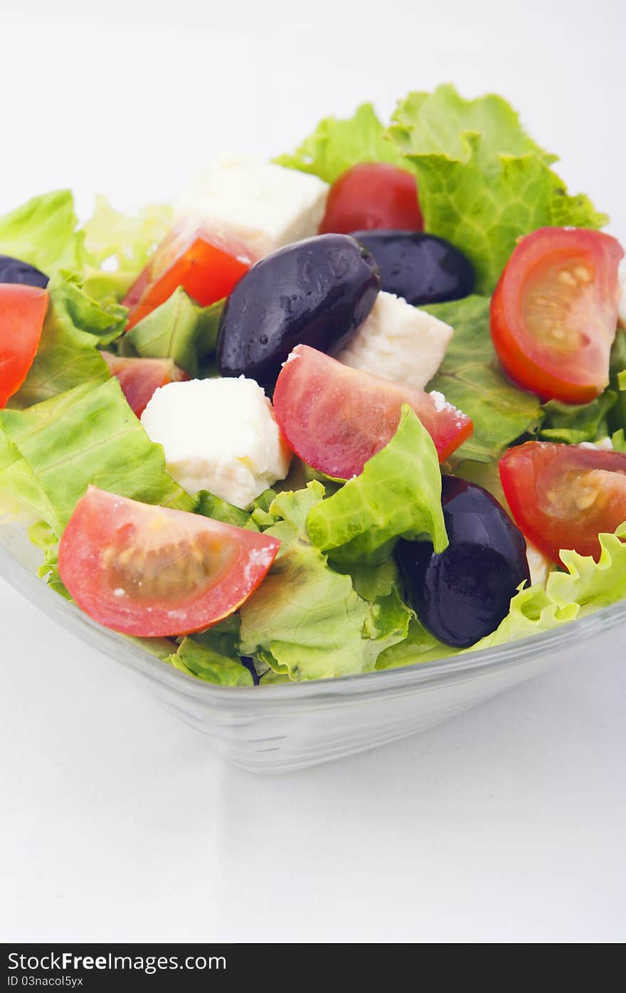 Salad with tomato and lettuce close up