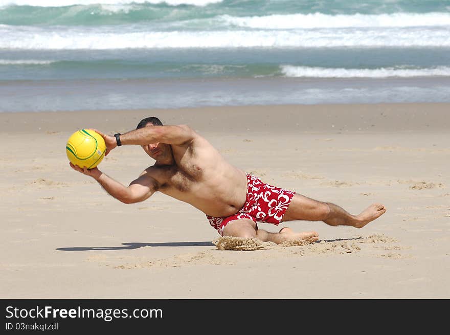 Fat man playing with a ball