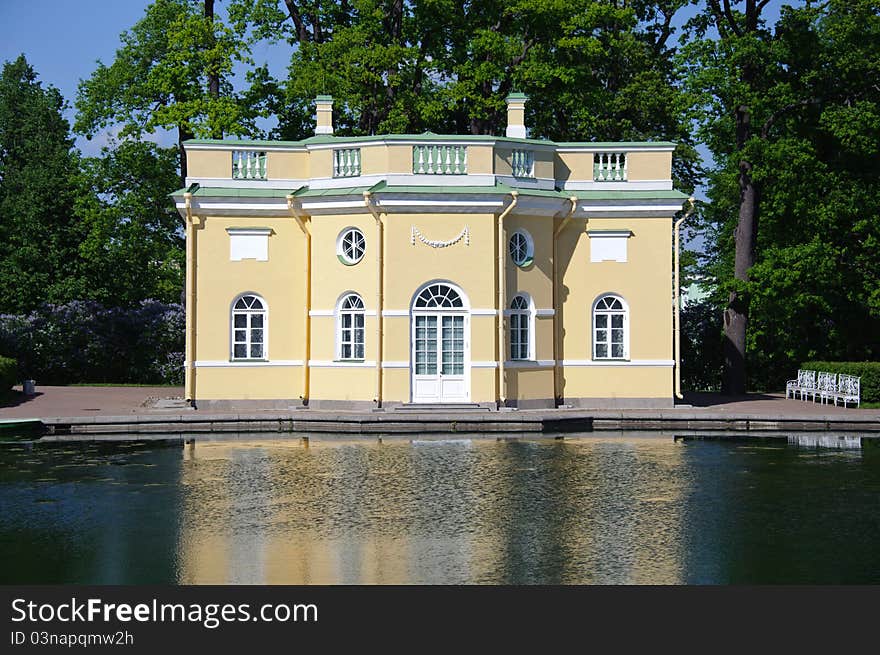 Antique baroque style lodge in the park by a pond. Pushkin ??city, Russia.