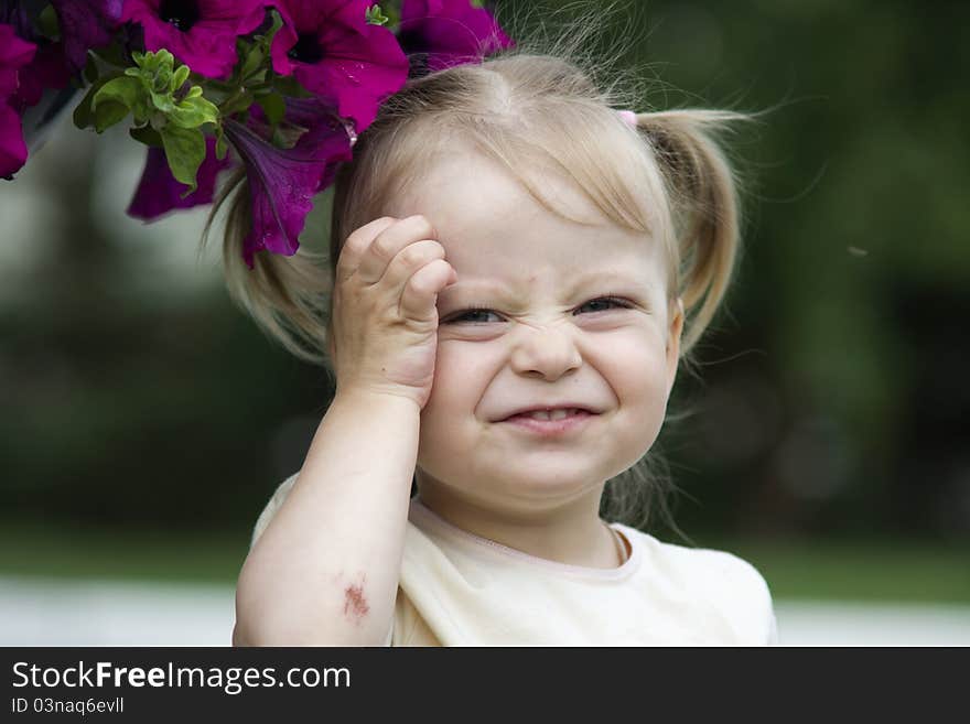 Amusing and laughing child in the garden. Amusing and laughing child in the garden