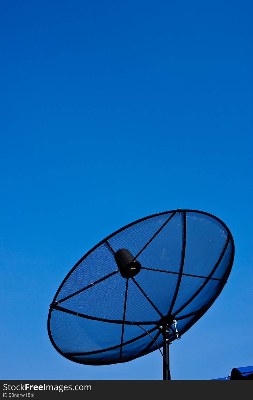 The satellite dish on a blue background.