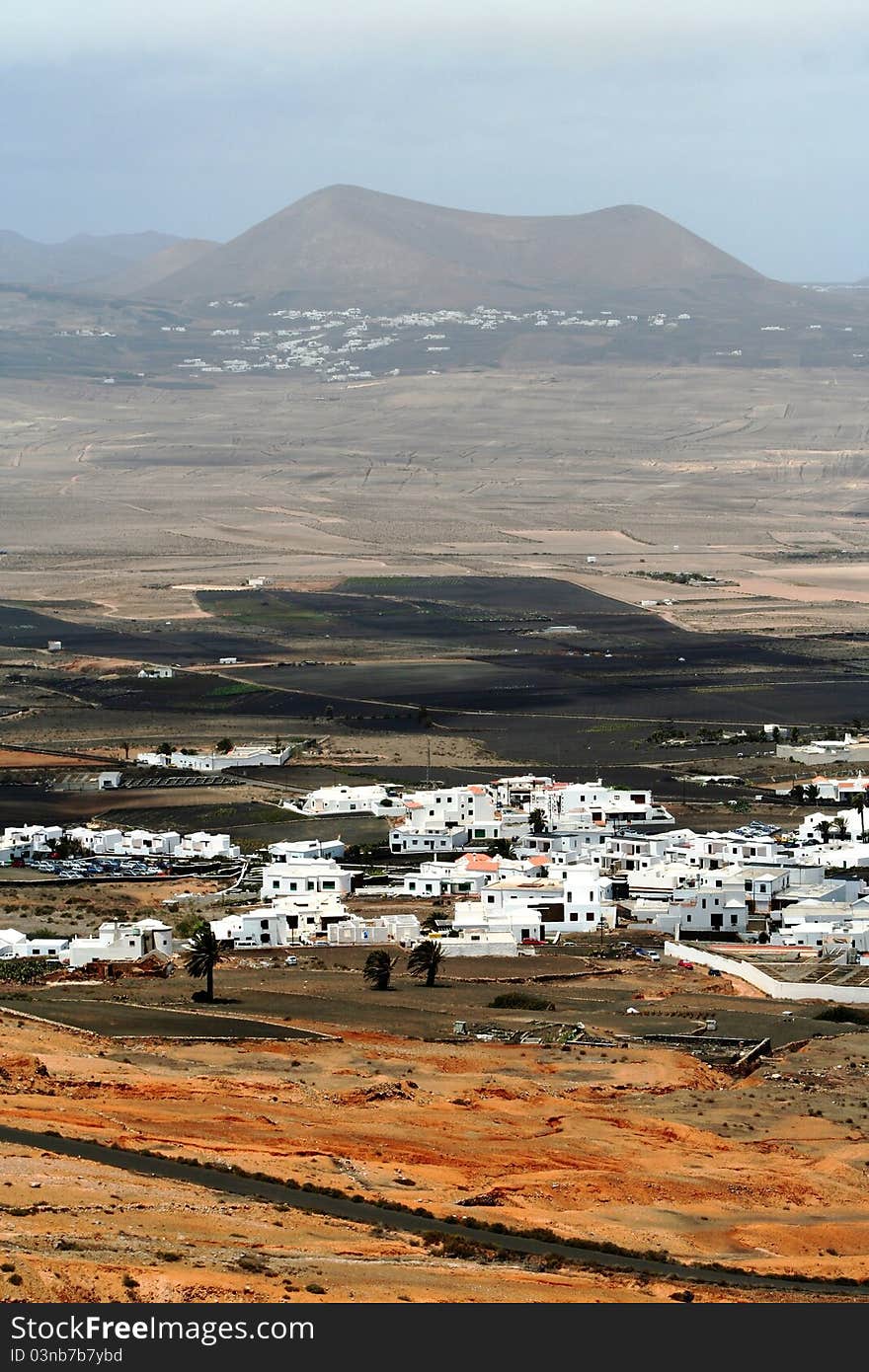 Isolated white houses village in a desert, Lanzarote, Canarias.