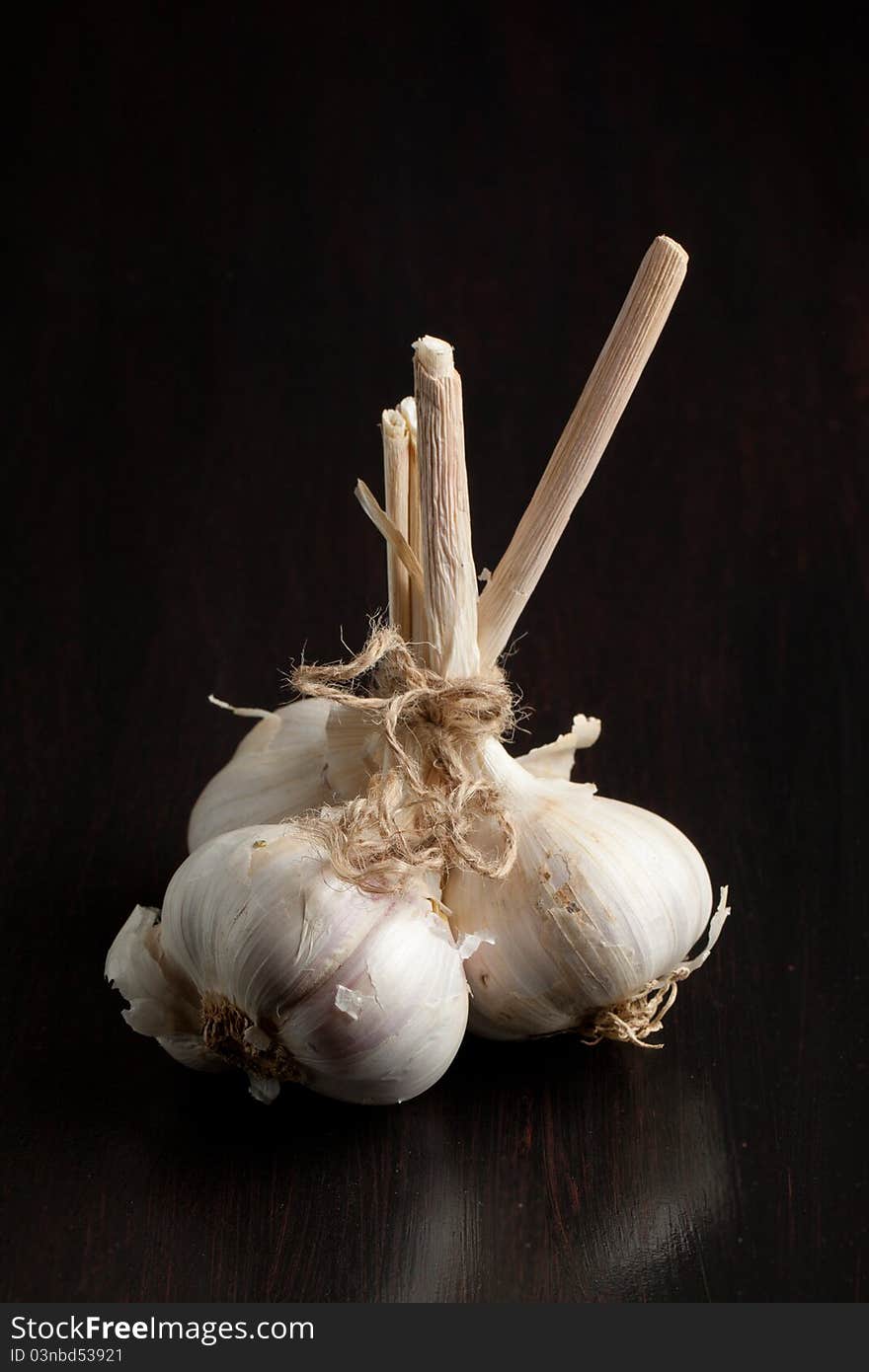 Bunch of garlic on black table