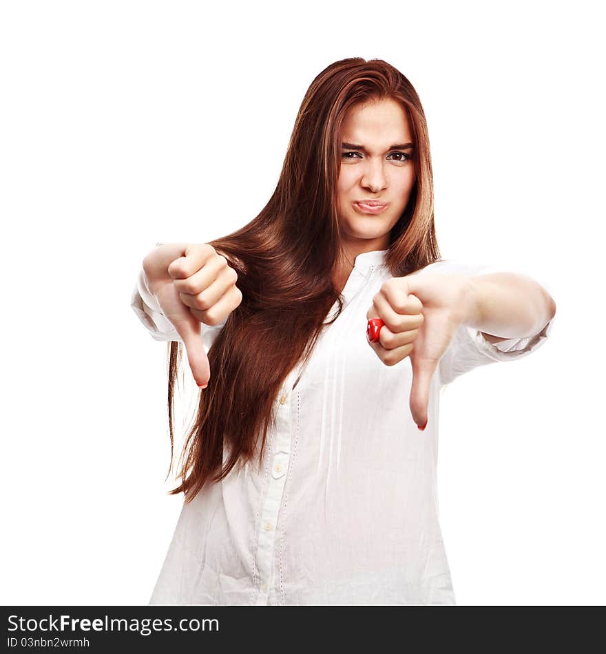 Young woman showing thumbs down isolated on white. Young woman showing thumbs down isolated on white