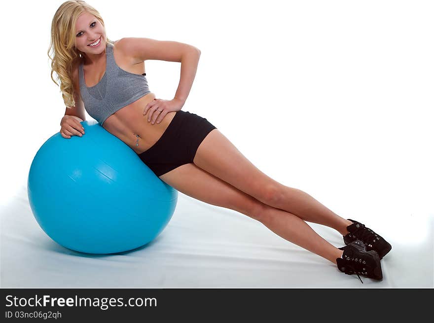 Beautiful Girl Exercising with a Ball