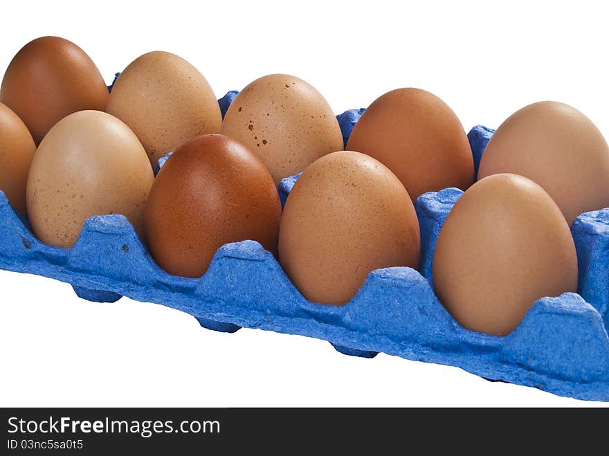 Eggs in the purple bin at an isolated white background. Eggs in the purple bin at an isolated white background.