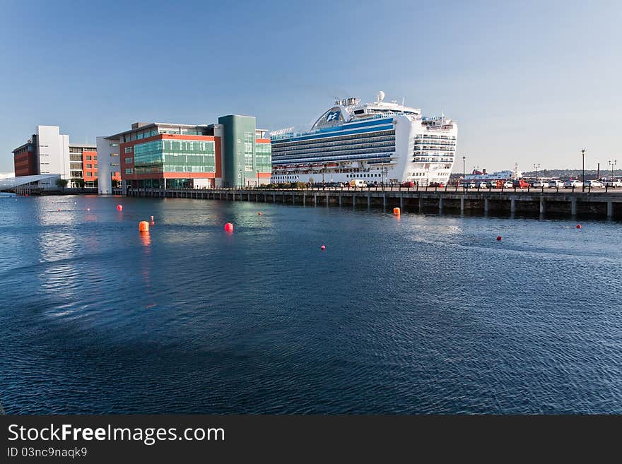 A large 113,000 ton cruise ship docked in liverpool at pier head. A large 113,000 ton cruise ship docked in liverpool at pier head.