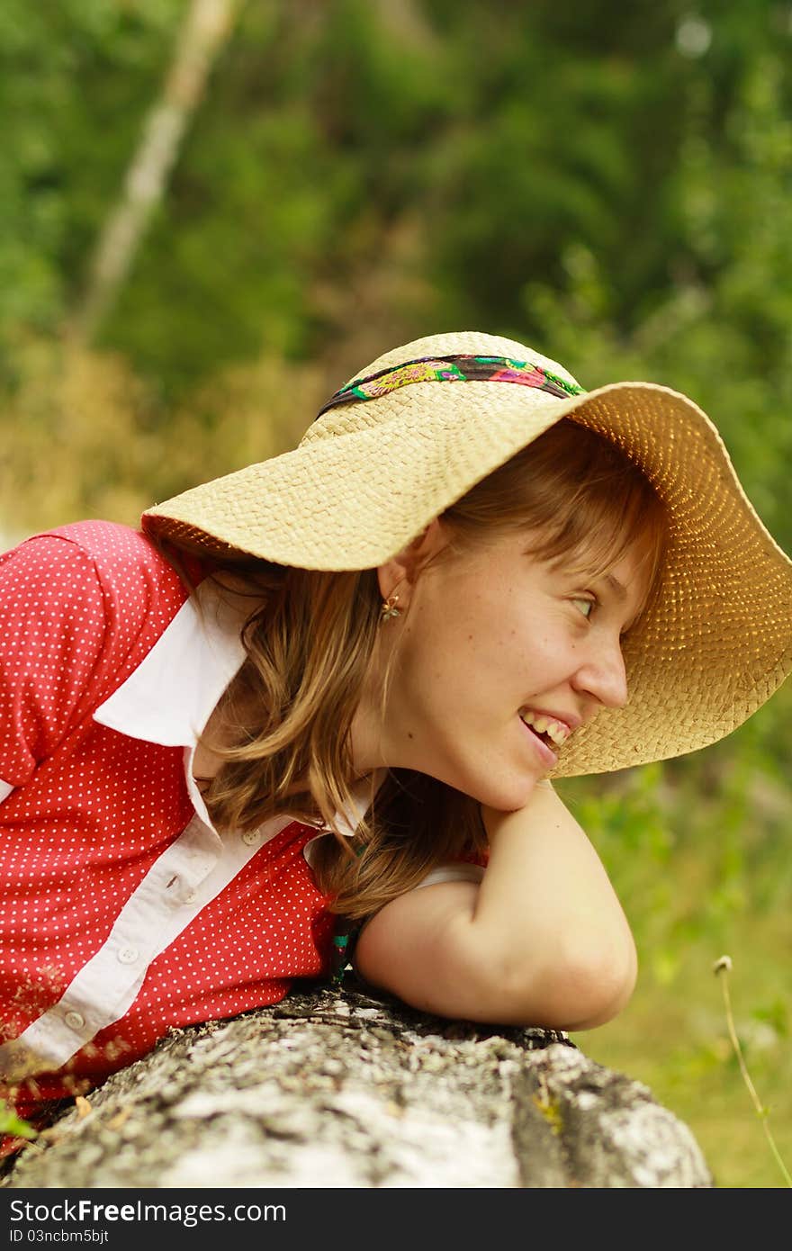 Curious young lady in summer nature