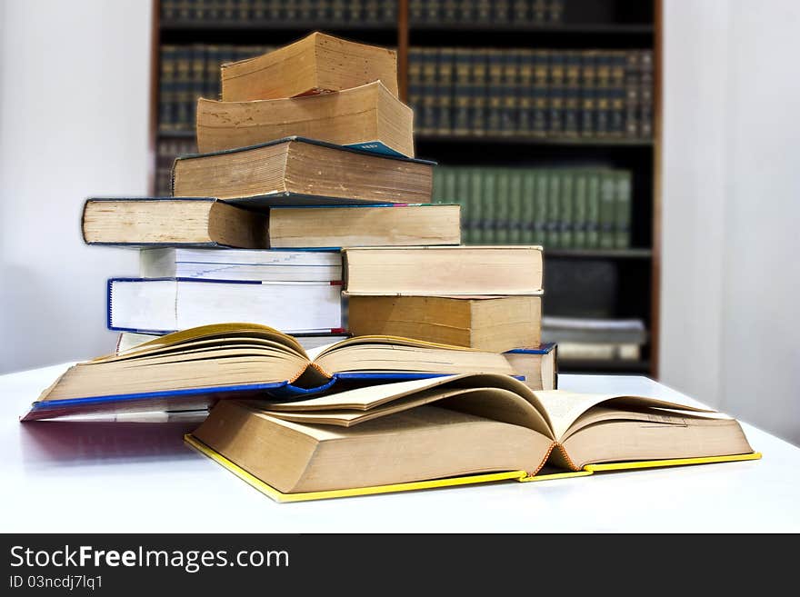 Pile of books in library with clipping path