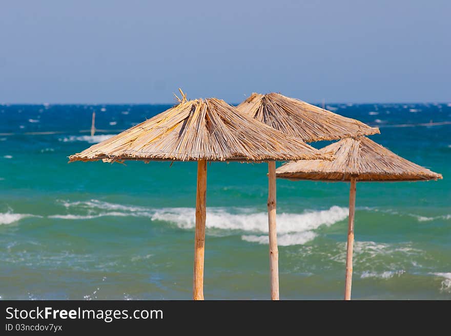 Bamboo Umbrellas on the beach. Bamboo Umbrellas on the beach