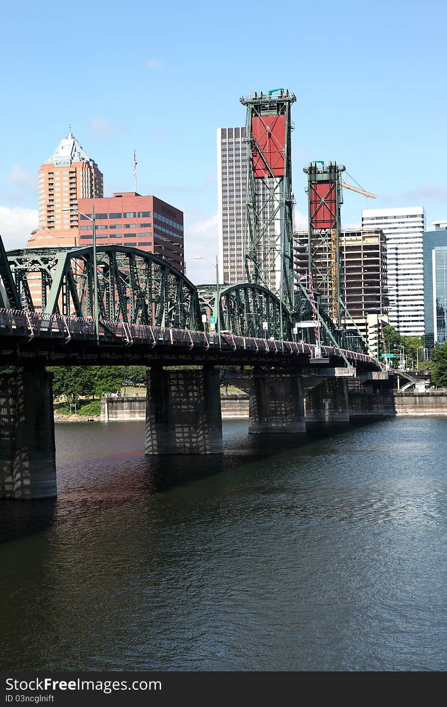 The Hawthorne bridge and Portland OR., skyline.