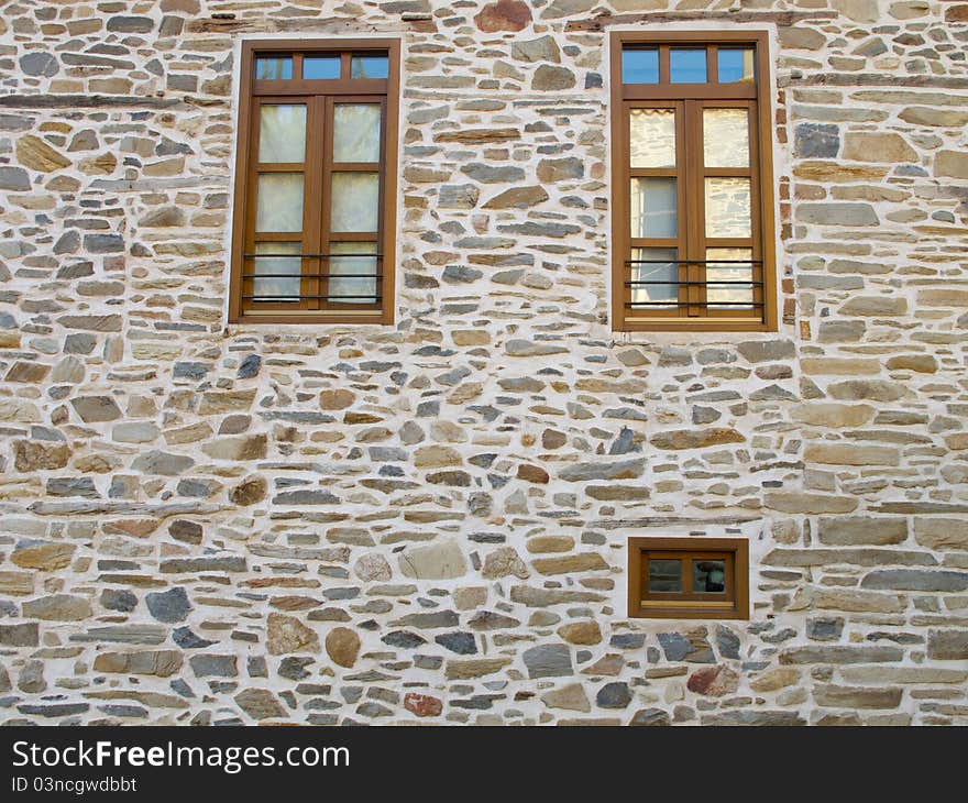 Old stone house with wooden doors windows and balkony in a greek vilage in halkidiki