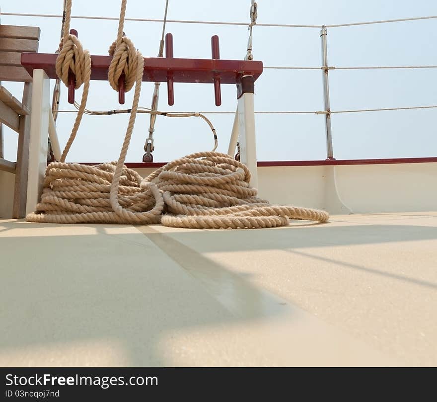 Coiled Rope Rigging On A Sailboat Deck.