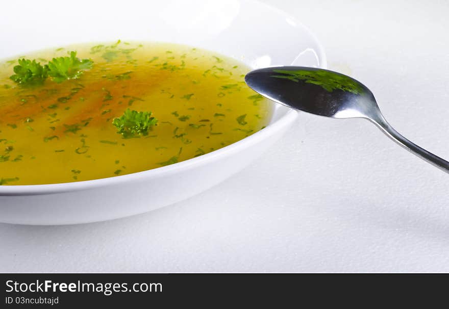 A fresh summery broth with leek onion, and carrot