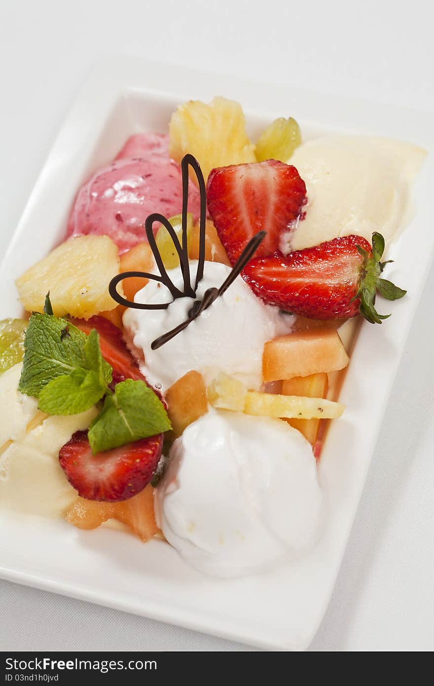 Fruits dessert with ice cream