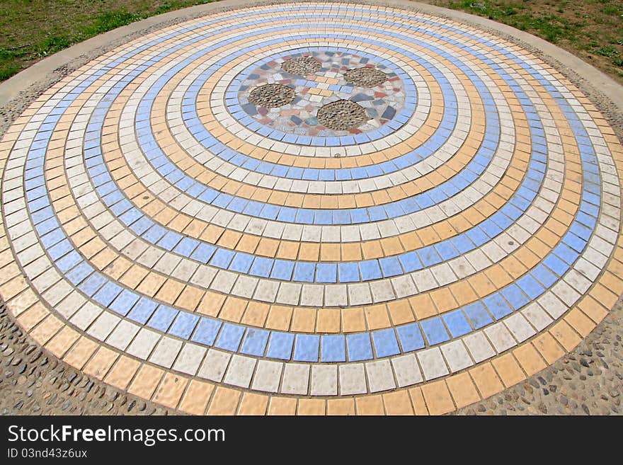 Ceramic tile concentric circles landscape architecture in a park. Ceramic tile concentric circles landscape architecture in a park