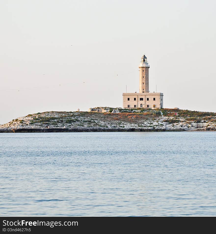 Lighthouse in front Vieste. Town of national park of Gargano. Apulia. Italy.