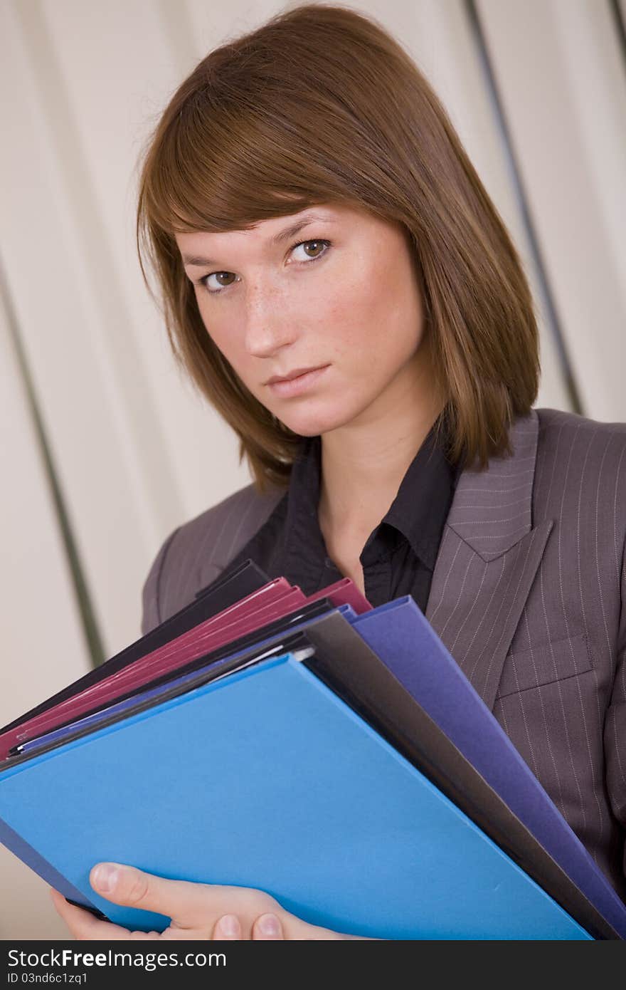 Businesswoman with files