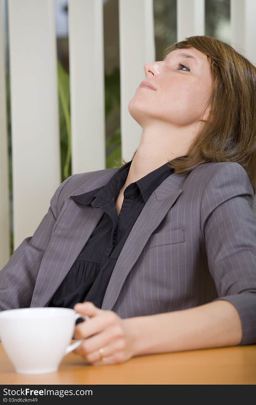 Relaxing Woman In Office