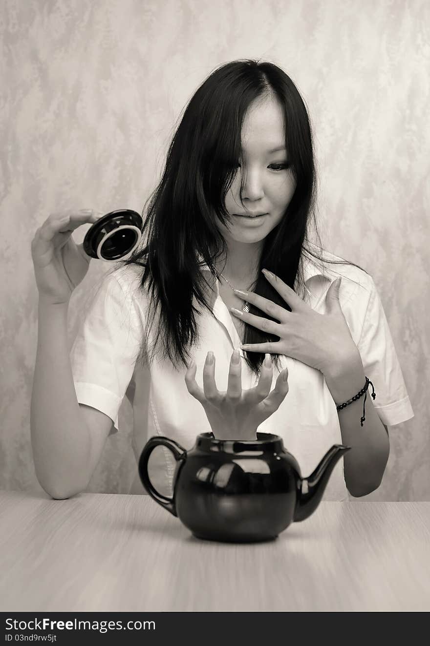 Girl and teapot