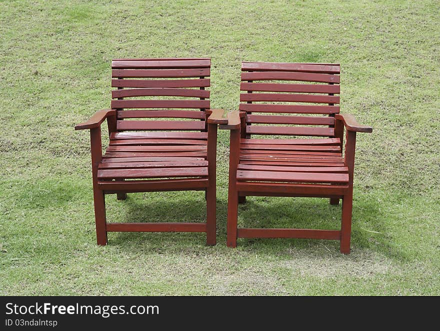 Two red chairs in the garden