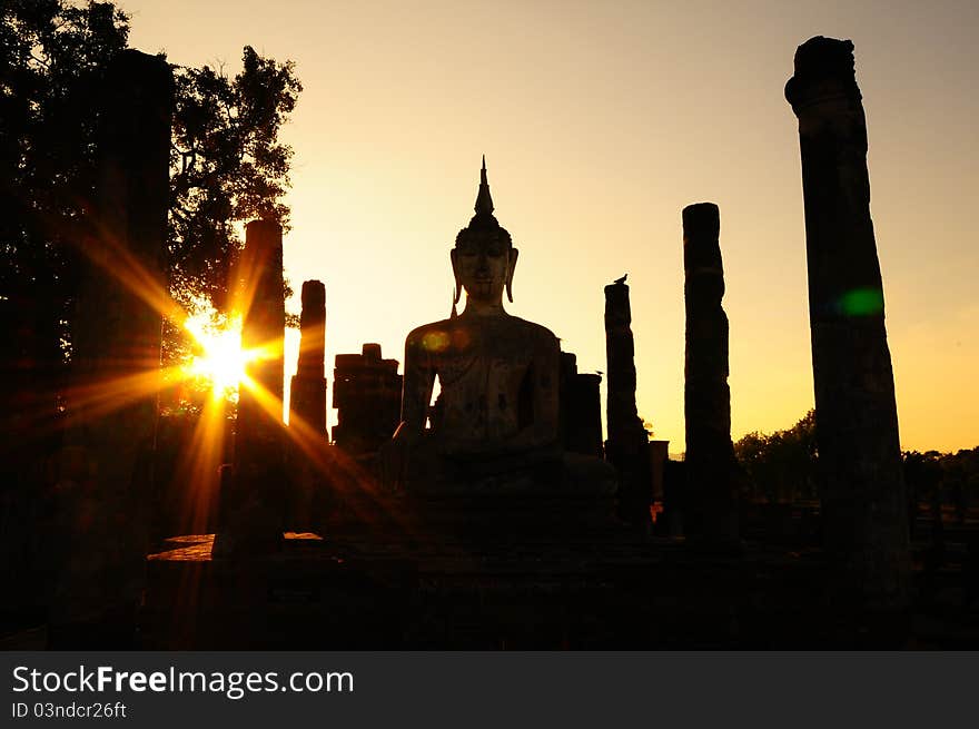 Buddha in sunset