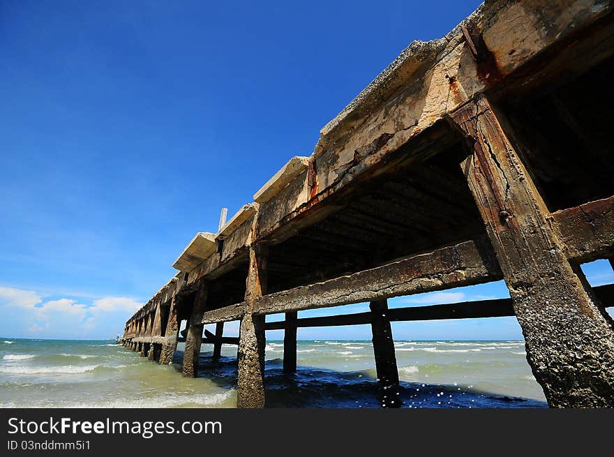 The old pier and blue sky. The old pier and blue sky