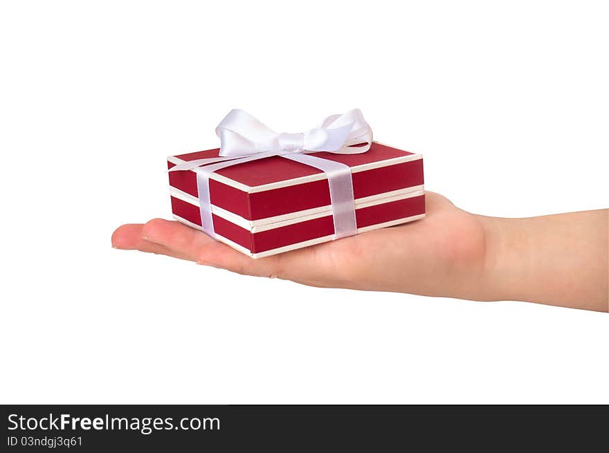 Gift box with ribbon in hand. Gift box with ribbon in hand