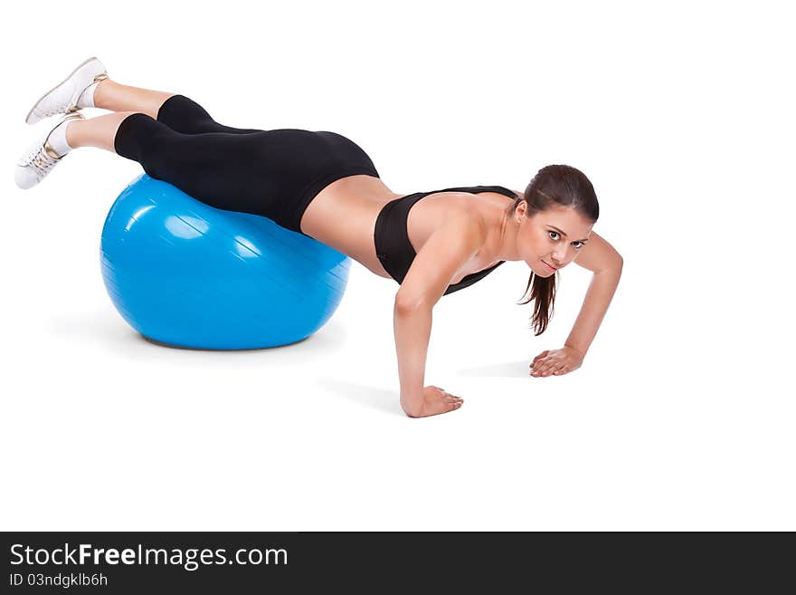 Strong girl excercising with fitbal