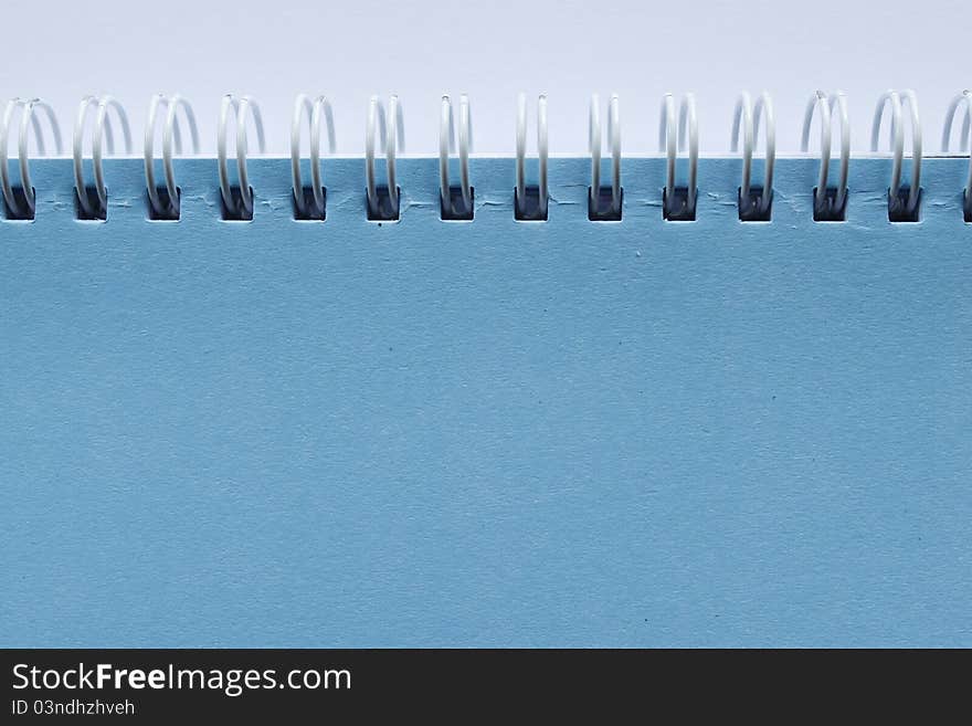 Blue sky color Cover Note Book on background