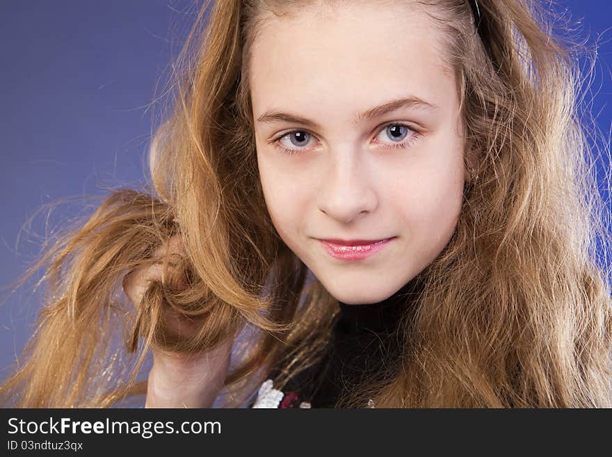 Portrait of a beautiful girl in studio