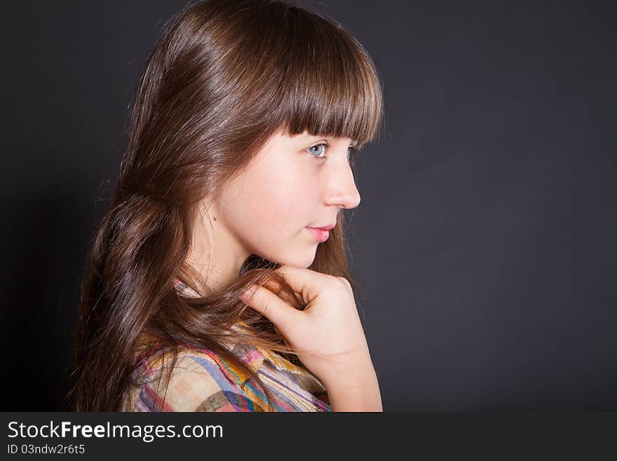 Portrait of a beautiful girl in studio