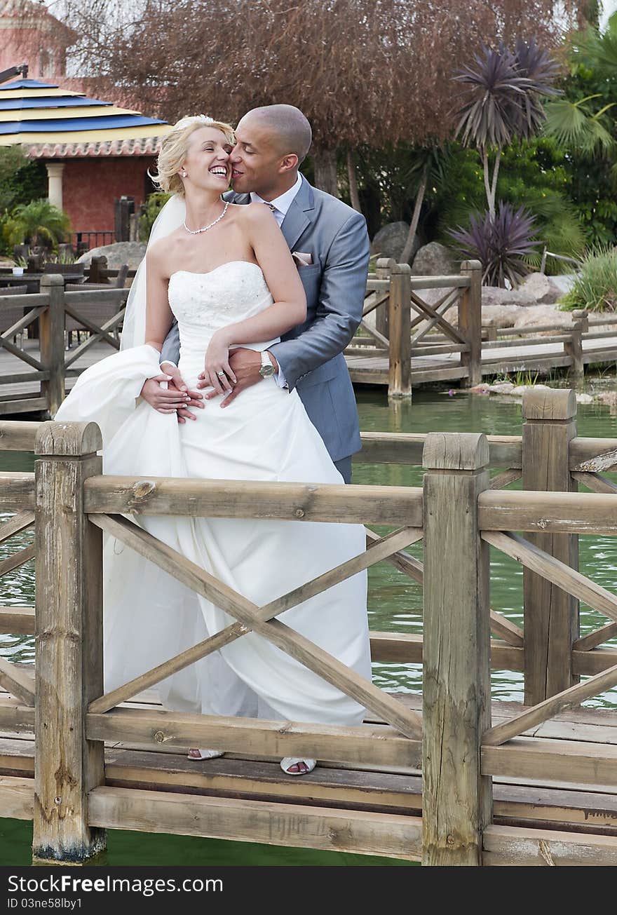 Bride and Groom in the sunshine at the reception at a golf course