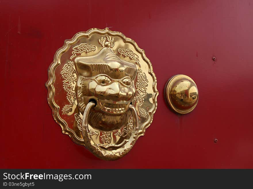 Closeup of metal knocker in china