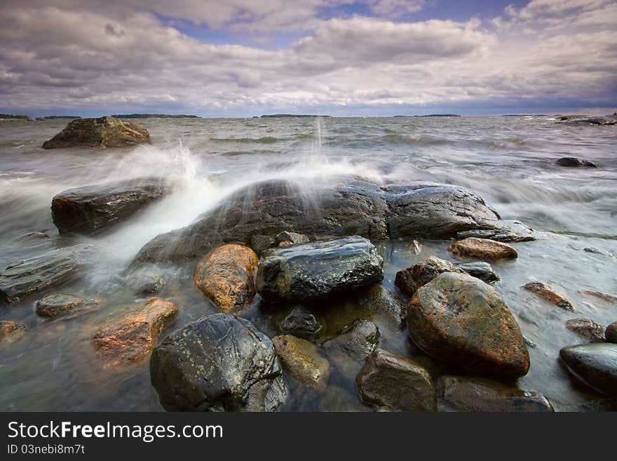 Cloudy and windy forenoon landscape from the beach. Cloudy and windy forenoon landscape from the beach