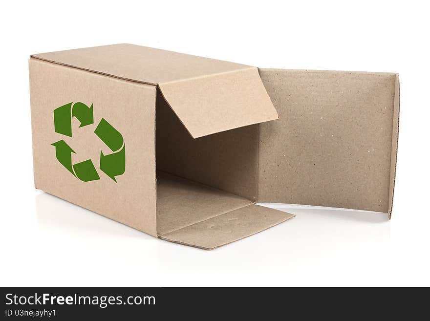 Green recycle sign on open paper box