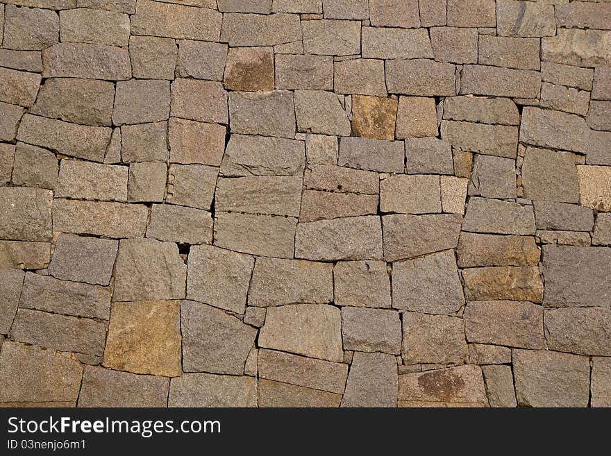 Wall made out of chiseled stacked stones. Wall made out of chiseled stacked stones