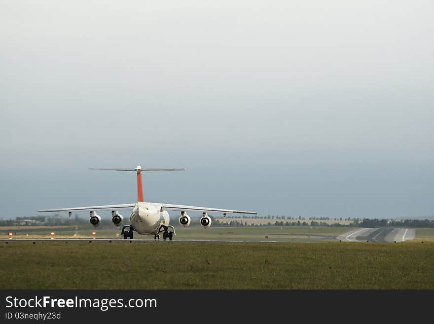 Airplane on begin runway is waiting for take off, Prague Ruzyne Airport.