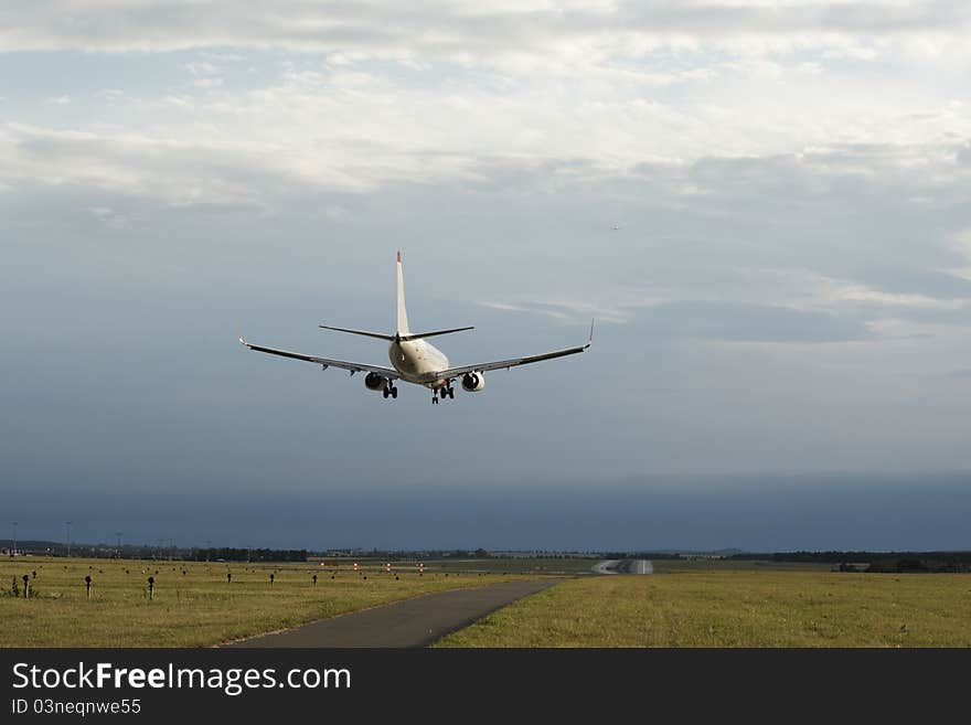 Airplane is landing in Prague International Airport, the Czech Republic.