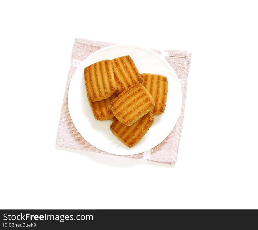 Cookies on white plate isolated on white background