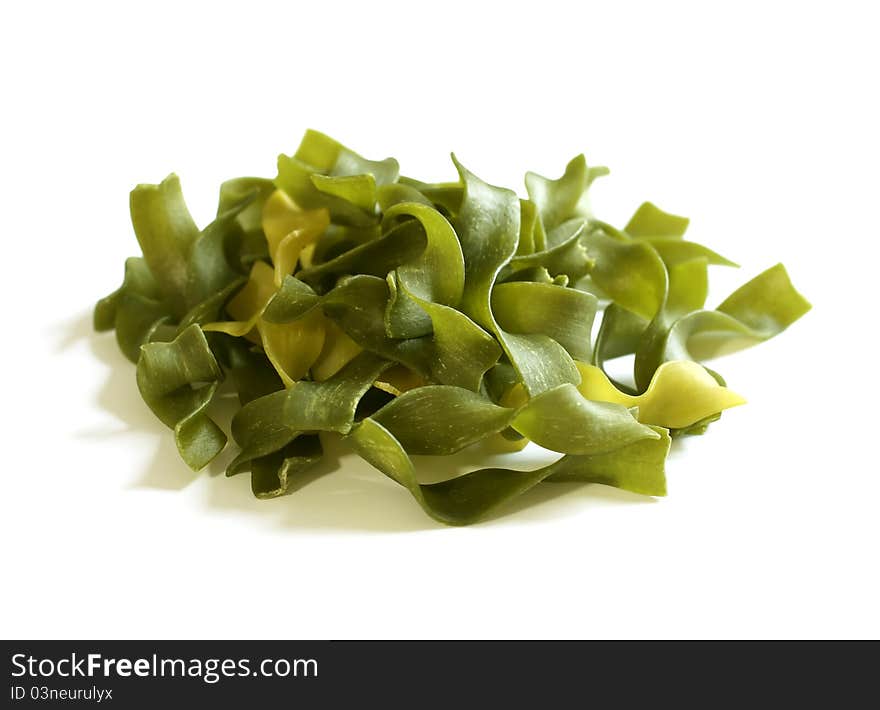 Green pasta isolated on white background