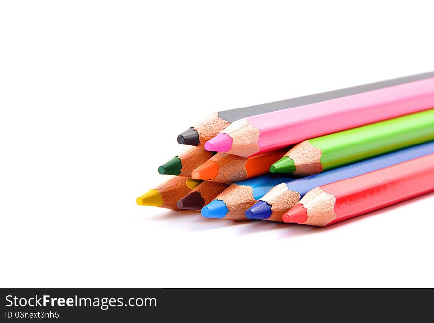 Various color pencils isolated on the white