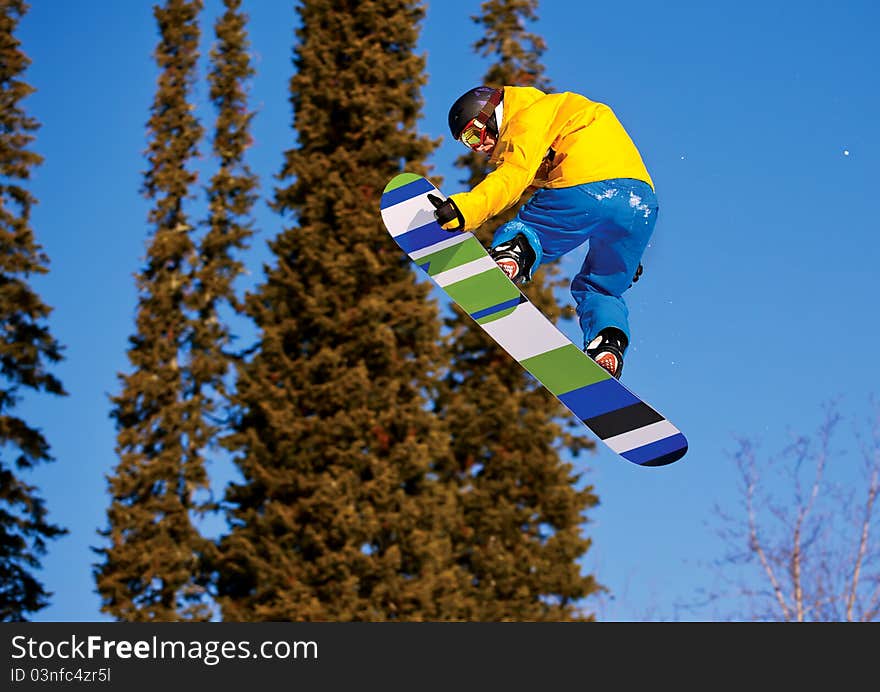 Snowboarder jumping