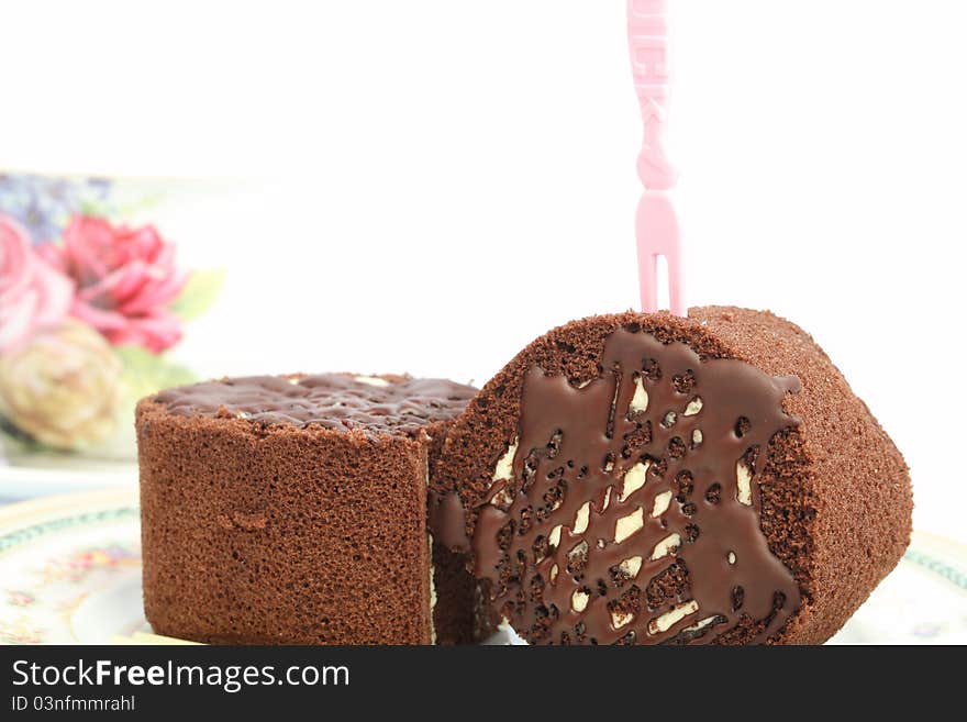 Cake chocolate and coffee on white background