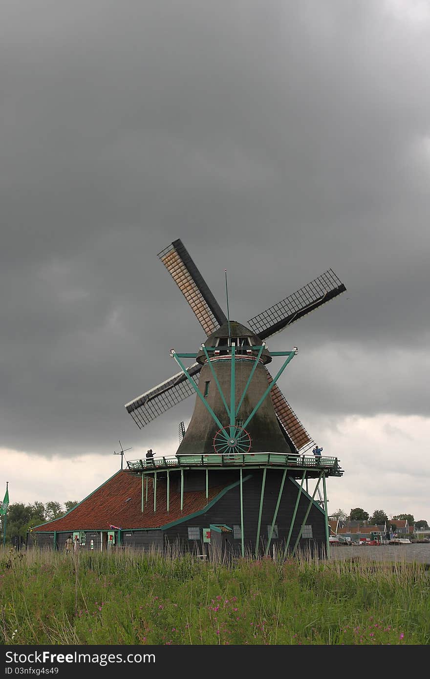 Typical Netherland windmill in a storm day