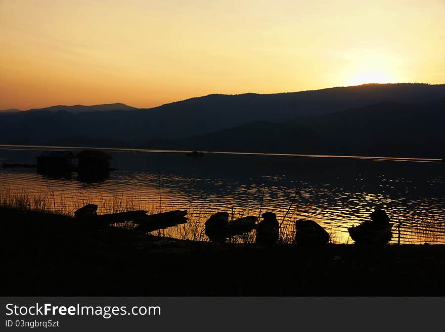 Sunset dusk at river silhouette. Sunset dusk at river silhouette