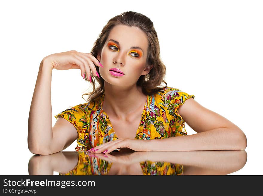 Beautiful woman and her reflection in mirror table