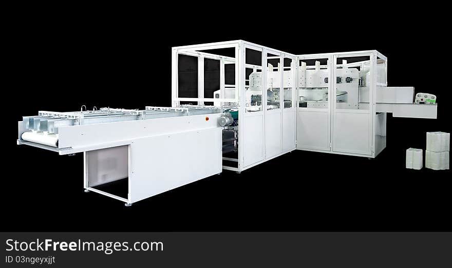 Packaging machine for paper rolls, serviettes and handkerchiefs.