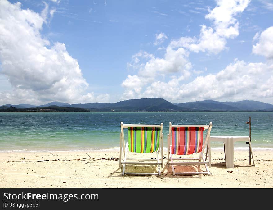 Beach chair on the beach with blue sky